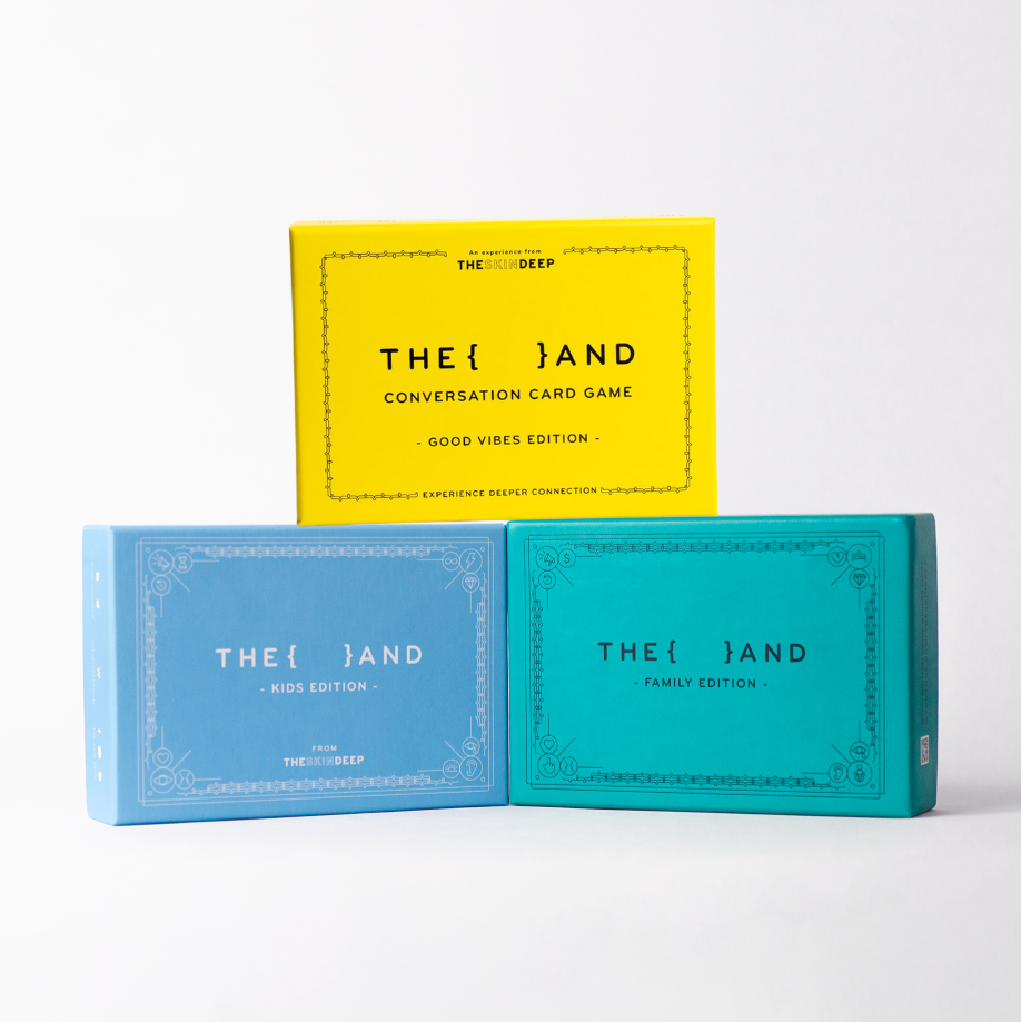 {THE AND} Family, Kids, And Good Vibes Edition card games stacked on one another